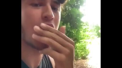 Handsome boy suck outdoor