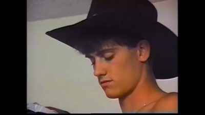 Young cowbow in leather chaps Buck Ford needs to celebrate successful rodeo riding and invited viking queen to do that