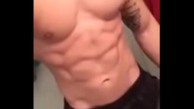 19yo bodybuilder flexing muscles shirtless