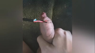 Amateur Boy whips cock with electric cord