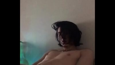 teen boy playing on webcam
