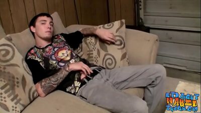 Inked straight guy toying and jerking his cock until he cums