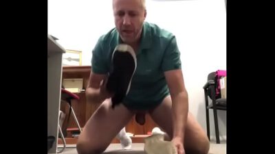 spank cock in office